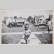 Young boy on sidewalk (ddr-densho-522-68)