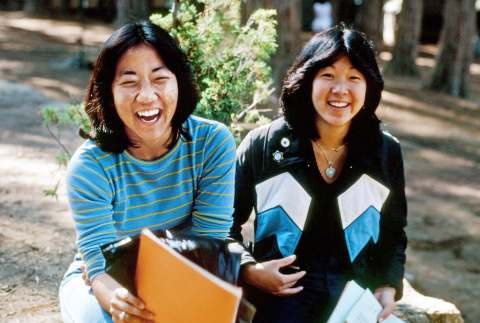 Emi Takizawa and Linda Kato holding their scrapbooks (ddr-densho-336-1068)