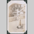 Photo of Kenji Ima swinging a bat (ddr-densho-483-1178)
