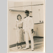 Tomoye (Nozawa) Takahashi with ship crew member on board ship (ddr-densho-426-1520)