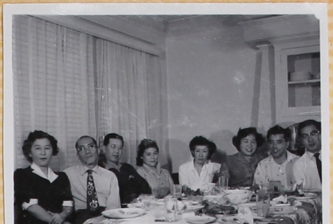 Group of men and women at a dinner party (ddr-densho-522-23)