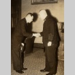 Two men shaking hands (ddr-njpa-1-2569)