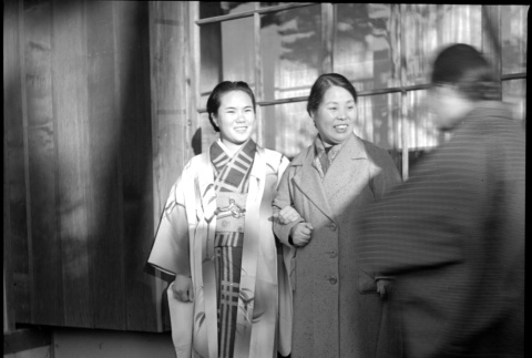 Two women outside building (ddr-densho-426-302)