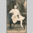 Portrait of girl sitting with flowers (ddr-densho-293-78)