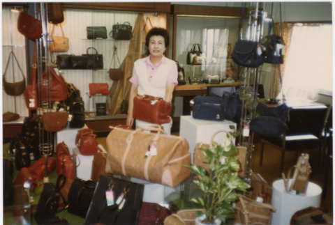 Woman standing in shop (ddr-densho-426-2)