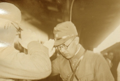 Kosho Otani in military uniform, saluting another officer (ddr-njpa-4-1640)