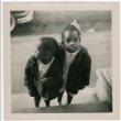 Two children standing on steps (ddr-densho-426-1397)