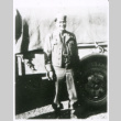 Soldier in front of truck (ddr-densho-1007-771)