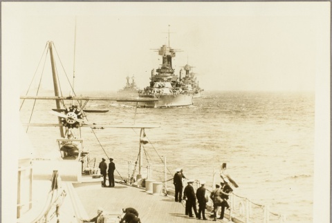 Sailors on a ship's deck looking at other ships (ddr-njpa-13-406)