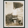 girl outside a house (ddr-densho-378-376)