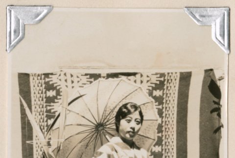 Woman in kimono with parasol (ddr-densho-383-185)
