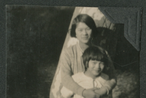 two girls hugging (ddr-densho-378-521)