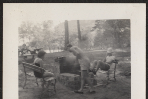 Three people in a park (ddr-densho-433-1175)