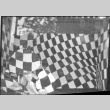 Large window display with checkered background (ddr-densho-426-2294)