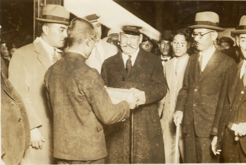A man greeted by a crowd (ddr-njpa-1-1894)