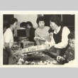 Women's auxiliary group making flower centerpieces (ddr-jamsj-1-408)