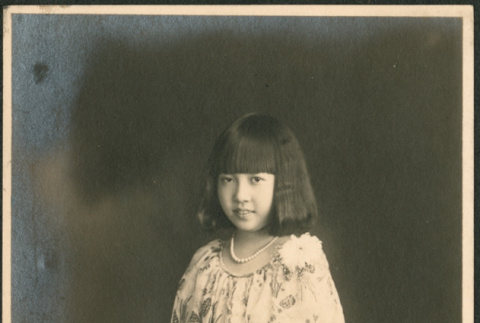 Portrait of girl in flowered dress (ddr-densho-293-38)
