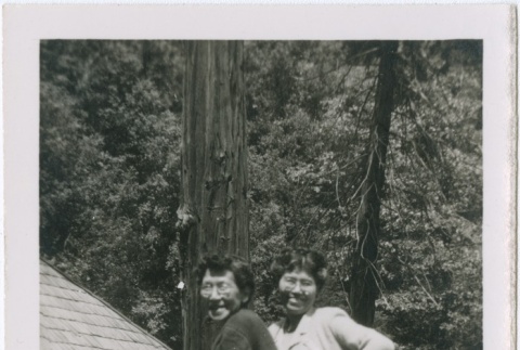 Two women standing next to a railing (ddr-densho-338-198)