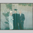 Man in graduation robe with Agnes and Chester Sakura (ddr-densho-523-429)