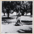 Two girls playing on lawn (ddr-densho-522-115)