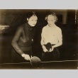 Two women playing ping pong (ddr-njpa-1-1376)