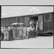 Japanese Americans waiting in mess hall line (ddr-densho-151-369)