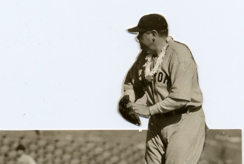 Babe Ruth in uniform, wearing a lei (ddr-njpa-1-1395)