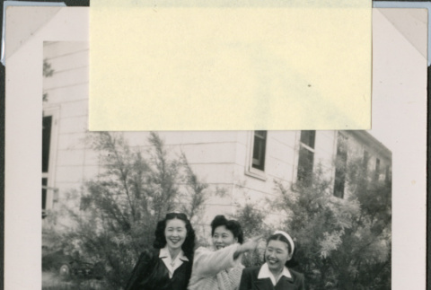 Three women sitting on lawn (ddr-densho-493-110)