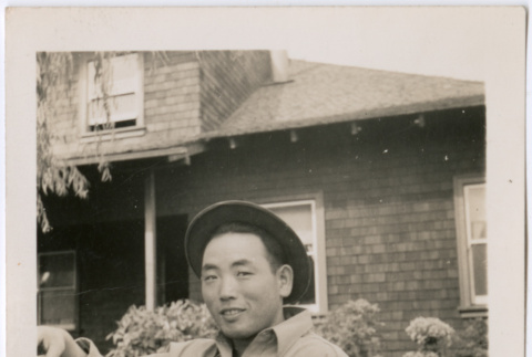 Young man on a bench (ddr-densho-377-1625)