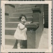 A girl on front steps (ddr-densho-321-1015)