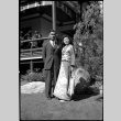 Tomoye (Nozawa) Takahashi with unknown man outside Japanese Pavilion at the Golden Gate International Exposition (ddr-densho-426-1987)