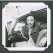 Man sitting in car (ddr-densho-471-123)