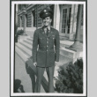Man standing on steps of building (ddr-densho-434-487)