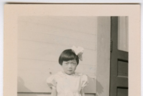 Girl in dress and hair bow (ddr-densho-313-50)