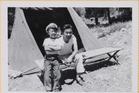 Man and two boys in front of tent (ddr-densho-522-307)