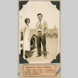 Man and woman standing next to car (ddr-densho-383-265)