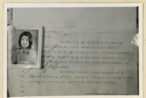 Legal document with a photograph (ddr-densho-37-1594)