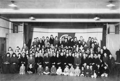 (Photograph) - Image of priests, nuns, men, women and children seated and standing (ddr-densho-330-262-master-d42e8588d7)