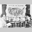 Japanese Americans at the library (ddr-densho-37-44)