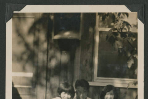 man and two women outside a house (ddr-densho-378-475)