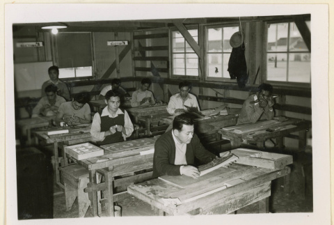 Group works on model ships (ddr-densho-37-1208)