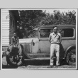 Man and boy by car (ddr-densho-434-429)
