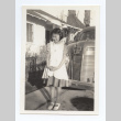 Girl wearing a dress and pinafore (ddr-one-6-1)
