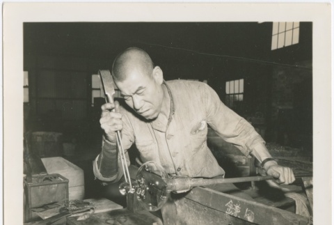 Japanese glassworker making a bowl (ddr-densho-299-65)