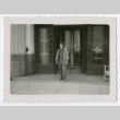 Soldier standing outside fo building (ddr-densho-368-204)