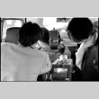Behind the scenes shot in car (ddr-densho-1007-1164)