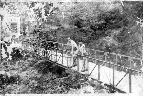[Japanese men on a bridge] (ddr-csujad-5-44)