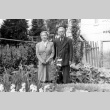 Issei couple in front of their postwar home (ddr-densho-2-37)