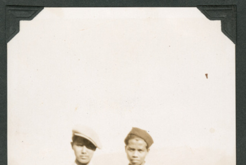 Photo of two men wearing striped pants (ddr-densho-483-221)