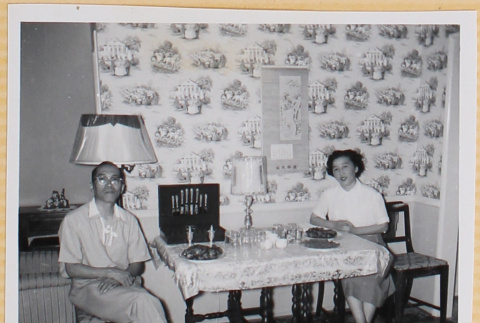 Couple sitting at table (ddr-densho-522-547)